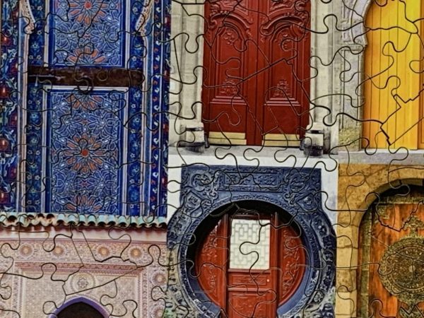 Product Image and Link for Doors To The World (557 Piece Wooden Jigsaw Puzzle)